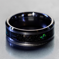 modern tungsten band with opal inlay