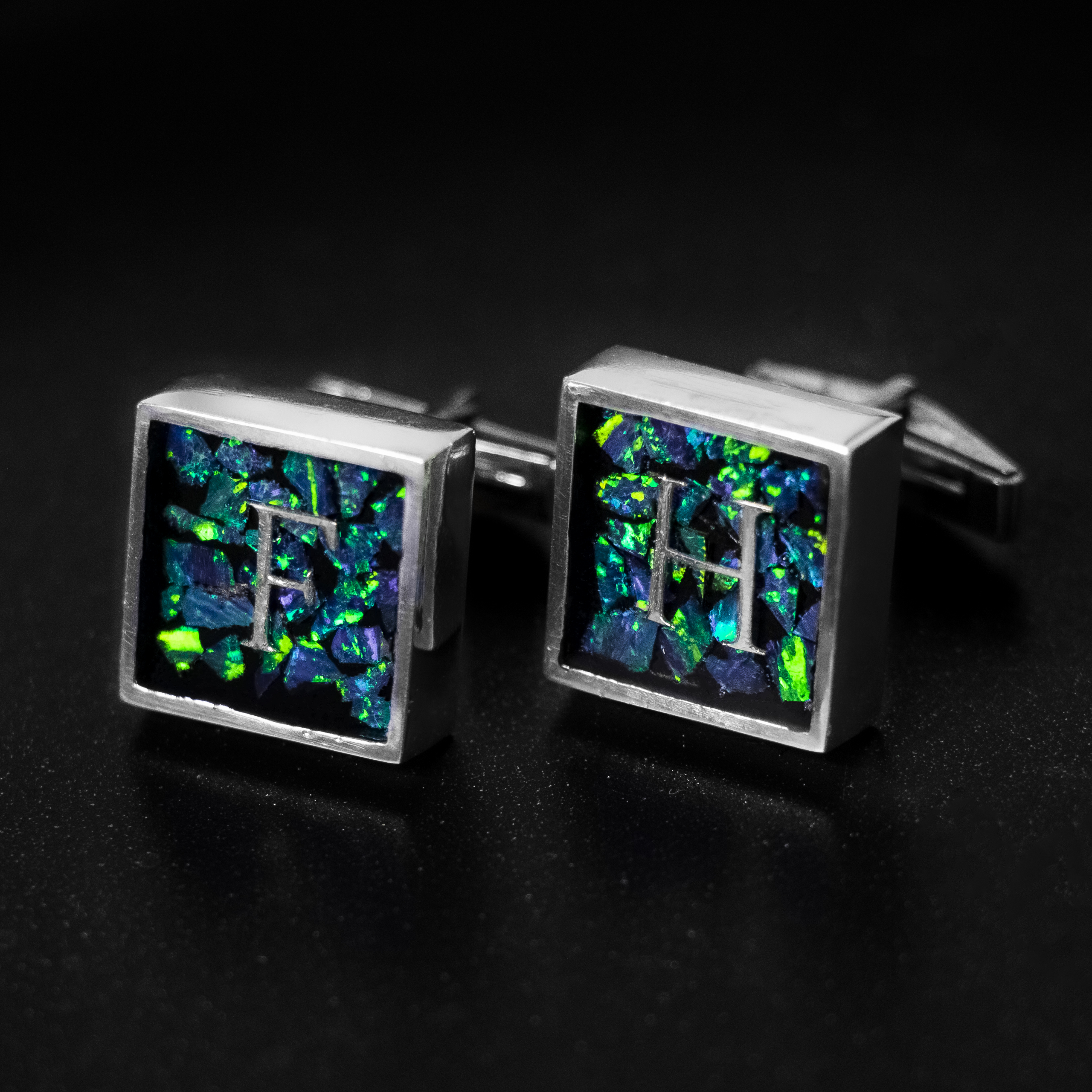 set of two monogram inlay cufflinks with green opals inlaid