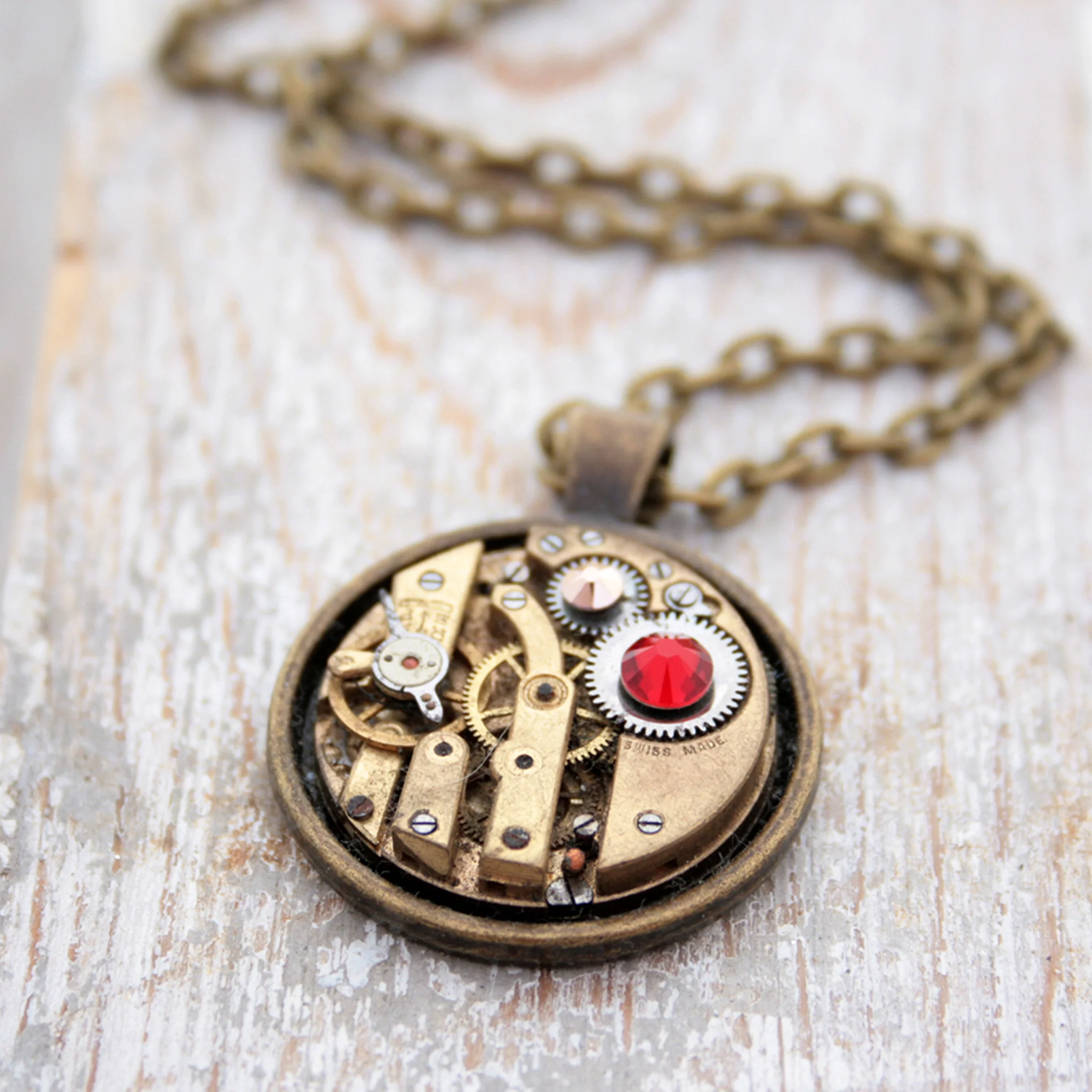 steampunk pendant with red ruby